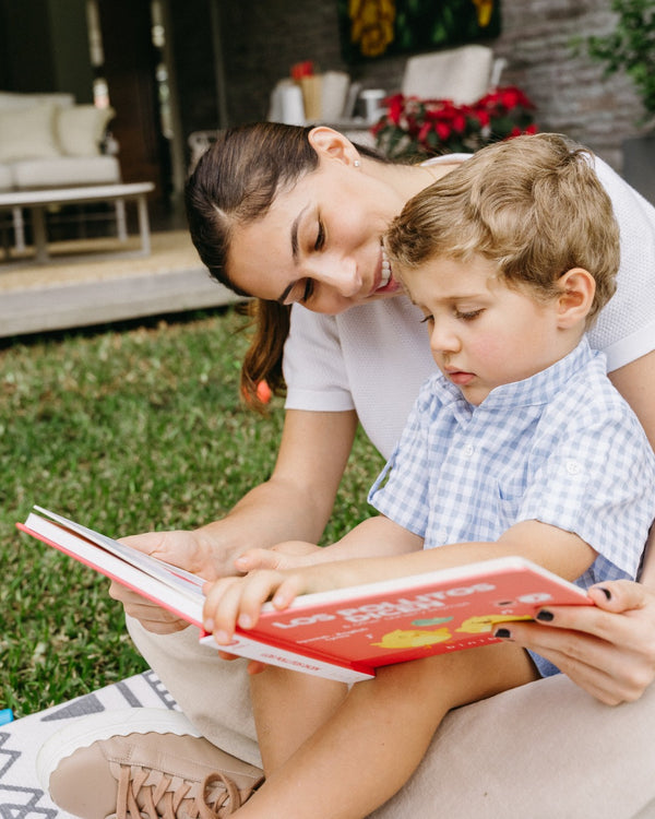 Bilingual mother and son read and sing along to Binibi's Los Pollitos Dicen & Other Nursery Rhymes book that features fun and popular nursery rhymes in Spanish